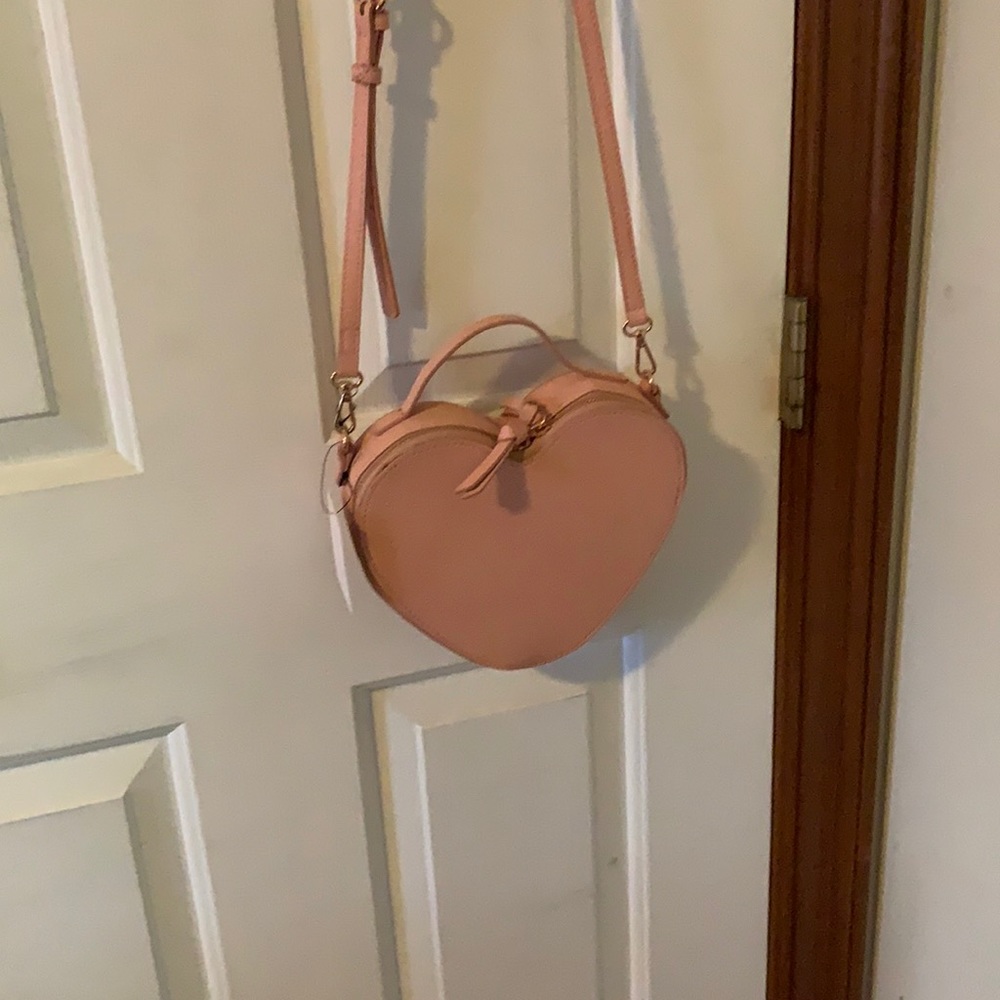 heart shaped pink purse